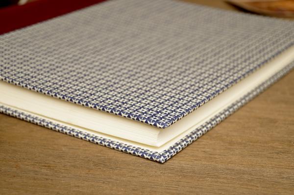 Photo album blue with star pattern and high-quality photo cardboard